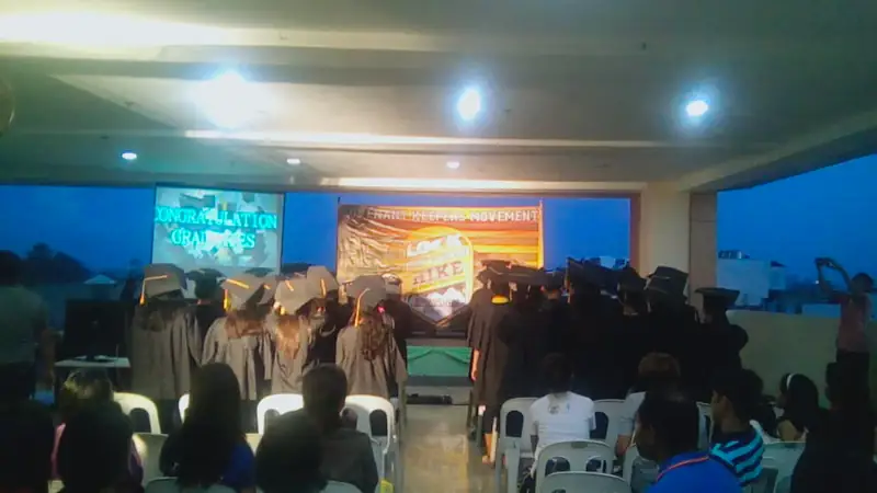 A stage program with graduates in togas