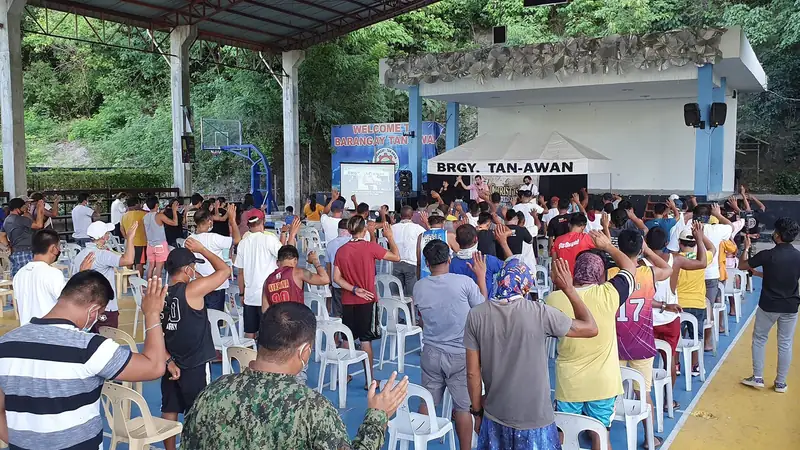 An outdoor worship gathering in Oslob